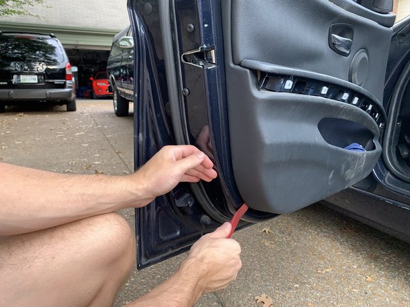 The door panel will still be attached at the top.