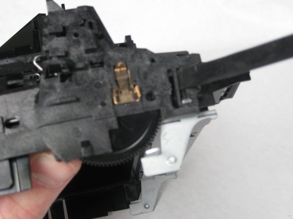 The next is located on the front of the plastic extension