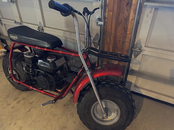 Coleman CT200U-AB Mini Bike Throttle Assembly Replacement, Reconnect Spark plug and seat: crwdns2935265:013crwdnd2935265:03crwdnd2935265:03crwdne2935265:0