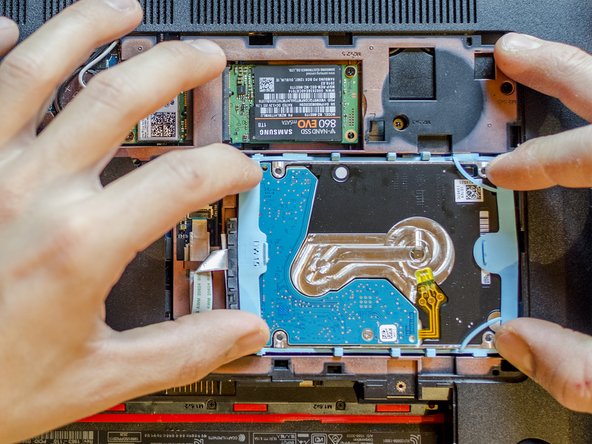 Install an mSATA SSD for the OS and keep the HDD as storage, Reinsert the HDD in its bay: step 14, image 3 of 3