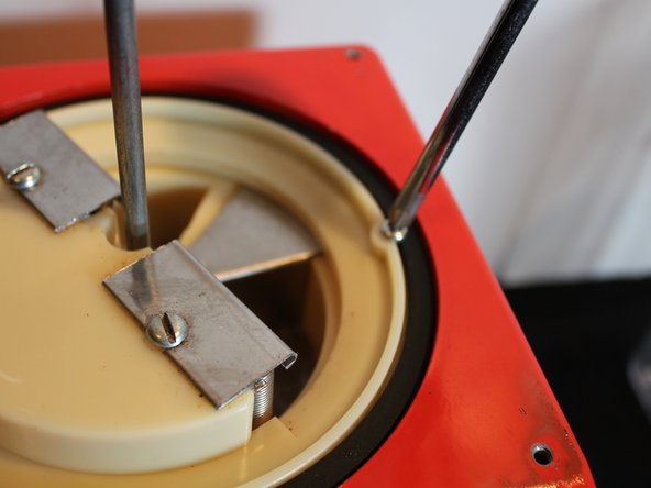 How to Fix a Stuck Quarter in a  Candy Machine: step 11, image 3 of 3