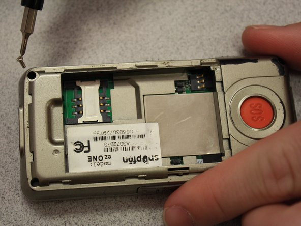 Snapfon ez One Motherboard Replacement, Remove the shield screws: crwdns2935265:04crwdnd2935265:03crwdnd2935265:03crwdne2935265:0