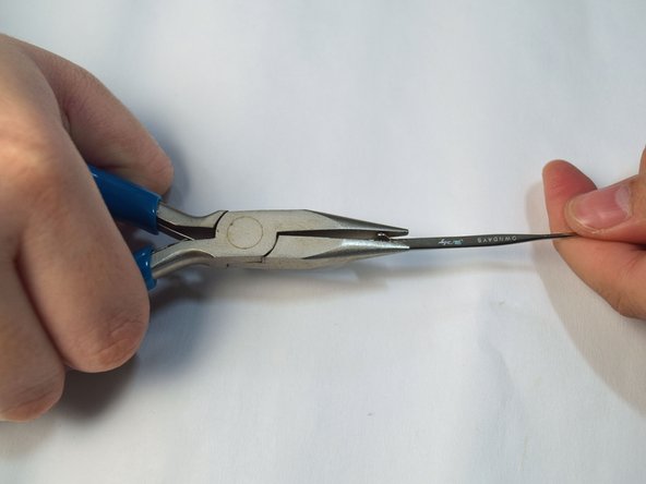 How to Repair Warped Eyeglasses Arm Joint and Replace the Screw: step 3, image 3 of 3