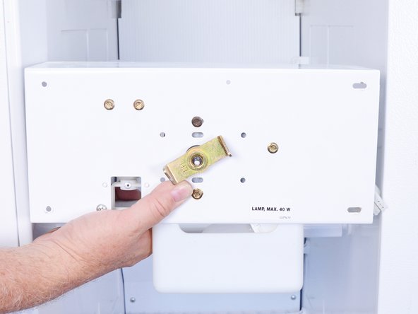 Whirlpool Older Model Side‑By‑Side Refrigerator  Auger Motor Replacement, Remove the auger motor assembly: step 9, image 1 of 2