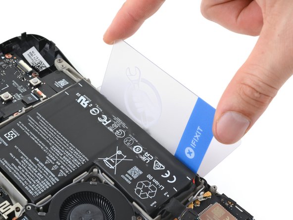 Steam Deck OLED Battery Replacement, Pry up the battery: crwdns2935265:025crwdnd2935265:02crwdnd2935265:03crwdne2935265:0