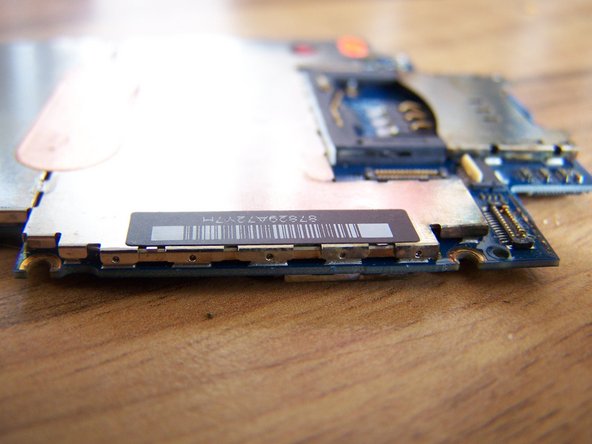 Repairing iPhone Liquid Damage, Removing the logic board shield cover: crwdns2935265:010crwdnd2935265:02crwdnd2935265:02crwdne2935265:0