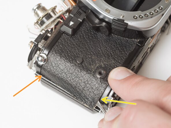 Pentax Super Program Front Lens Board Removal, Remove front leatherette panels: crwdns2935265:07crwdnd2935265:02crwdnd2935265:03crwdne2935265:0