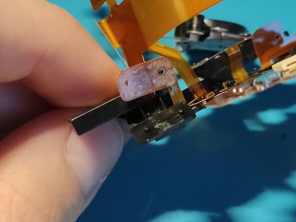 Sony A7 II Top Flex Cable replacement, Inserting it back into the plastic frame: crwdns2935265:036crwdnd2935265:03crwdnd2935265:03crwdne2935265:0