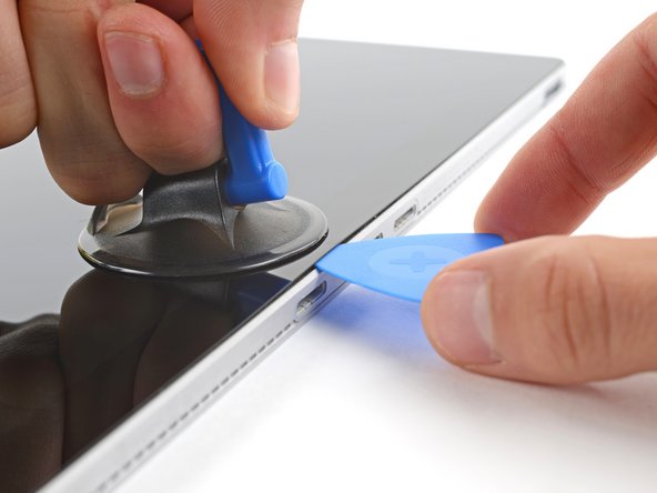 Microsoft Surface Book Screen Replacement, Insert an opening pick: crwdns2935265:05crwdnd2935265:03crwdnd2935265:03crwdne2935265:0
