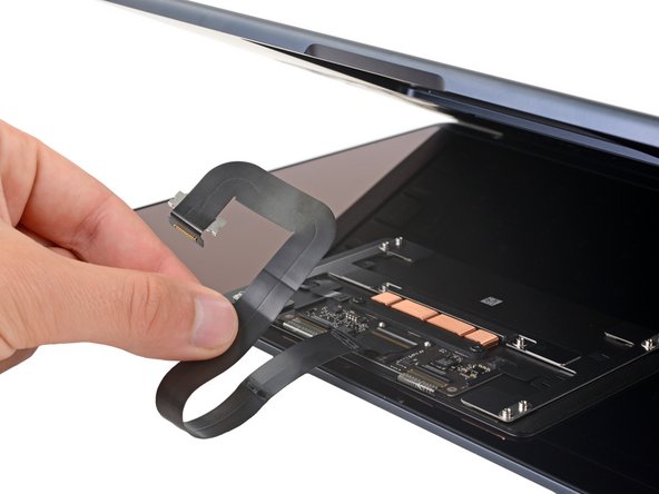 MacBook Air 2022 (M2) Trackpad Replacement, Free the trackpad cable: crwdns2935265:017crwdnd2935265:02crwdnd2935265:02crwdne2935265:0