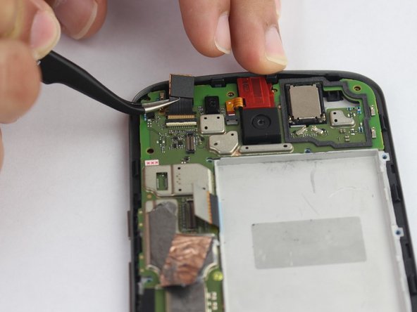 Peel back and remove any tape covering the front-facing camera's flex cable connector.