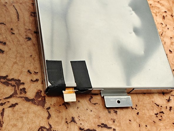 Asus ROG Claymore II Battery Replacement, Applying the new battery: crwdns2935265:08crwdnd2935265:02crwdnd2935265:03crwdne2935265:0