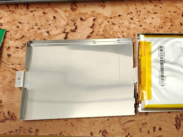 Asus ROG Claymore II Battery Replacement, Removing the old battery: crwdns2935265:07crwdnd2935265:02crwdnd2935265:03crwdne2935265:0