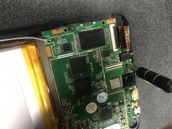 SuperSonic Matrix Mid SC-999 Screen Sensor Replacement, Taking Out the Second Screw: crwdns2935265:03crwdnd2935265:02crwdnd2935265:02crwdne2935265:0