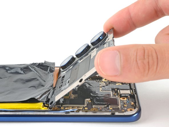 Motorola Edge 5G UW (2022) Screen Replacement, Remove the motherboard cover: crwdns2935265:019crwdnd2935265:02crwdnd2935265:03crwdne2935265:0