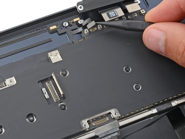 MacBook Air 15" 2023 Battery Replacement, Disconnect the logic board cables: crwdns2935265:035crwdnd2935265:02crwdnd2935265:03crwdne2935265:0