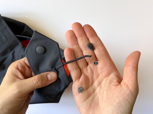 Cord Lock Replacement, Release the drawcord: crwdns2935265:02crwdnd2935265:03crwdnd2935265:03crwdne2935265:0