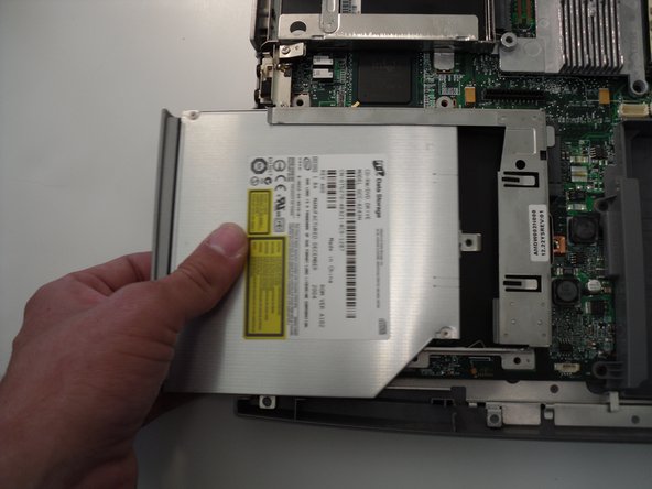 Removing Dell Inspiron 1150 Optical drive, Removing Dell Inspiron 1150 Optical drive: crwdns2935265:04crwdnd2935265:03crwdnd2935265:03crwdne2935265:0