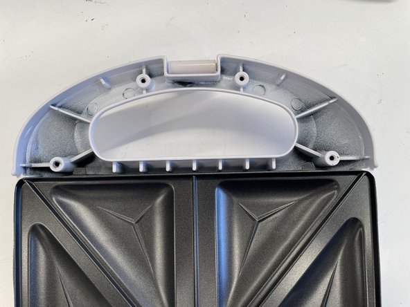 Anko 2 Sandwich Jaffle Maker Teardown, Removal of Top Internal Handle Plate: crwdns2935265:010crwdnd2935265:02crwdnd2935265:02crwdne2935265:0