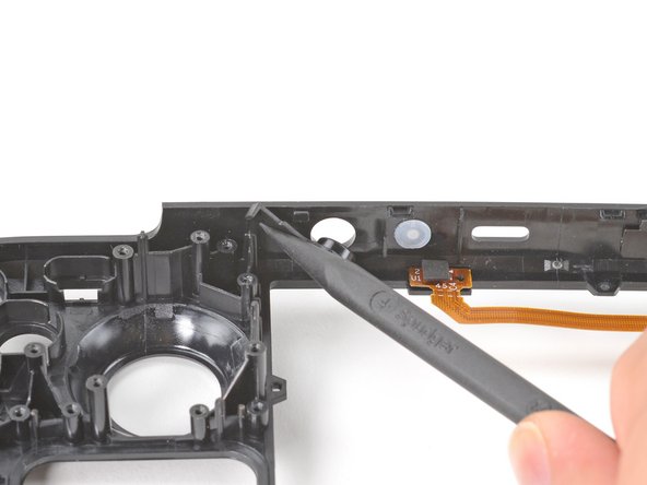 Steam Deck Front Shell Replacement, Remove the power button: crwdns2935265:0100crwdnd2935265:02crwdnd2935265:03crwdne2935265:0