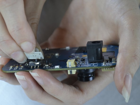 Belkin NetCam HD Circuit Board Replacement, Switch Cover: step 14, image 2 of 2