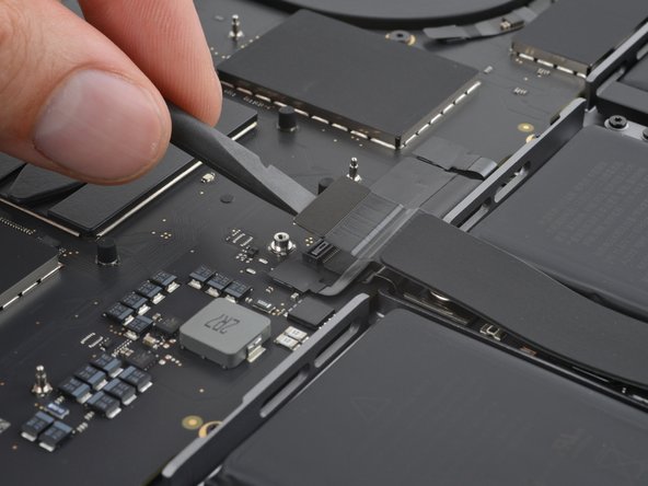 MacBook Pro 14" Late 2023 (M3) USB-C Ports Replacement, Disconnect the trackpad: crwdns2935265:09crwdnd2935265:02crwdnd2935265:02crwdne2935265:0