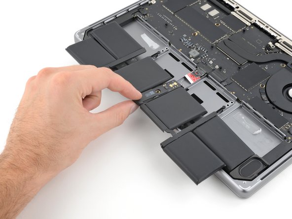 MacBook Pro 14" Late 2023 (M3) Battery Replacement, Remove the battery: crwdns2935265:035crwdnd2935265:02crwdnd2935265:03crwdne2935265:0