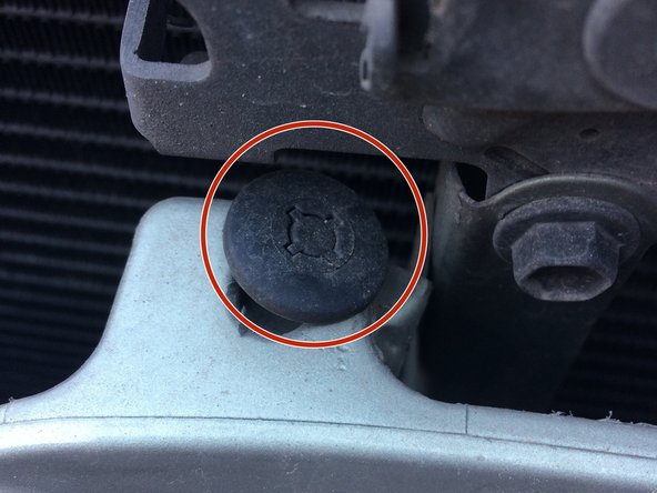 Toyota Yaris (Echo) 1999-2005 optical headlight unit replacement, Central bumper attachment: step 3, image 2 of 2