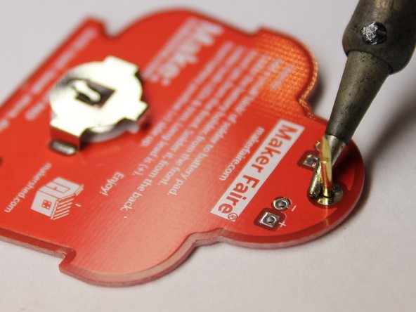 Learn to solder electronics with the Maker Shed Solder Badge!, Position the pin: crwdns2935265:015crwdnd2935265:03crwdnd2935265:03crwdne2935265:0