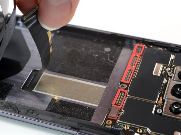 OnePlus 7T Screen Replacement, Separate the display cable: crwdns2935265:019crwdnd2935265:03crwdnd2935265:03crwdne2935265:0