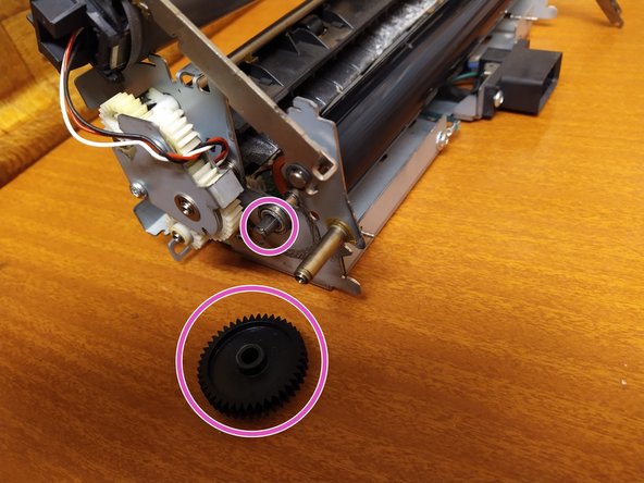 Fuser pressure roller replacement for Lexmark MS710 series printer, Remove the drive cog: crwdns2935265:07crwdnd2935265:02crwdnd2935265:02crwdne2935265:0