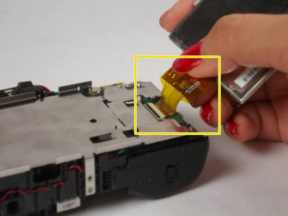 Nikon Coolpix L610 Camera Lens Replacement, Removing the LCD Screen Ribbon: crwdns2935265:08crwdnd2935265:02crwdnd2935265:02crwdne2935265:0