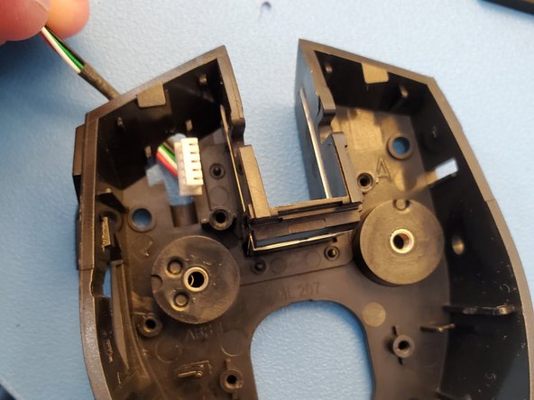 Corsair Vengeance M65 Mouse Wheel Button Replacement, remove usb cord from mouse body: step 11, image 3 of 3
