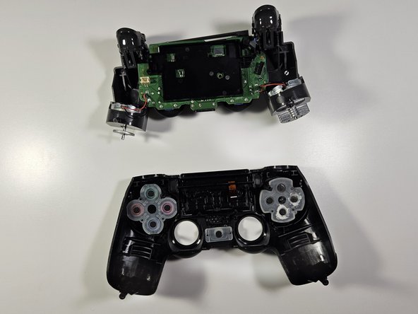 DualShock 4 CUH-ZCT2U D-pad Gasket Replacement: crwdns2935265:05crwdnd2935265:03crwdnd2935265:03crwdne2935265:0