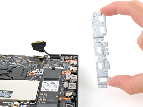 Lenovo ThinkPad T16 Gen 3 Motherboard Replacement, Remove the I/O bracket: stap 0, afbeelding 2 van 2