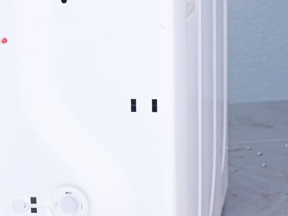 LG Front Load Washing Machine Drain Hose Replacement, Unclip the drain hose: crwdns2935265:032crwdnd2935265:03crwdnd2935265:03crwdne2935265:0