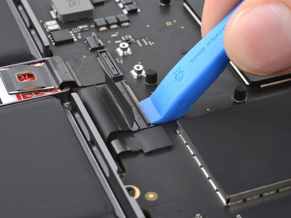 MacBook Pro 14" Late 2023 (M3) USB-C Ports Replacement, Unlatch the keyboard ZIF connector: crwdns2935265:042crwdnd2935265:02crwdnd2935265:02crwdne2935265:0