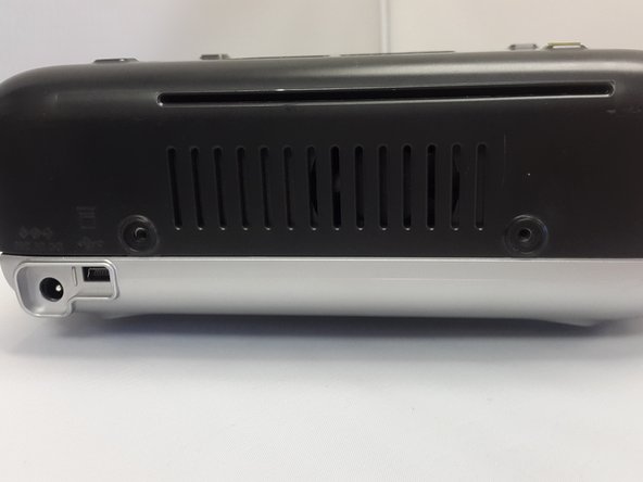 Kodak Easyshare Printer Dock (Series 3) Paper Jam Solution, Disconnecting the power adapter: crwdns2935265:03crwdnd2935265:02crwdnd2935265:02crwdne2935265:0