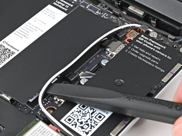 Framework Laptop 13 Mainboard Replacement, Lift the antenna cables: step 19, image 3 of 3