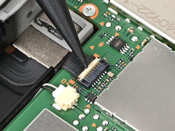 Nintendo Switch 2 Right Joy-Con 2 Connector Replacement, Disconnect the right Joy‑Con 2 connector cable: crwdns2935265:035crwdnd2935265:03crwdnd2935265:03crwdne2935265:0