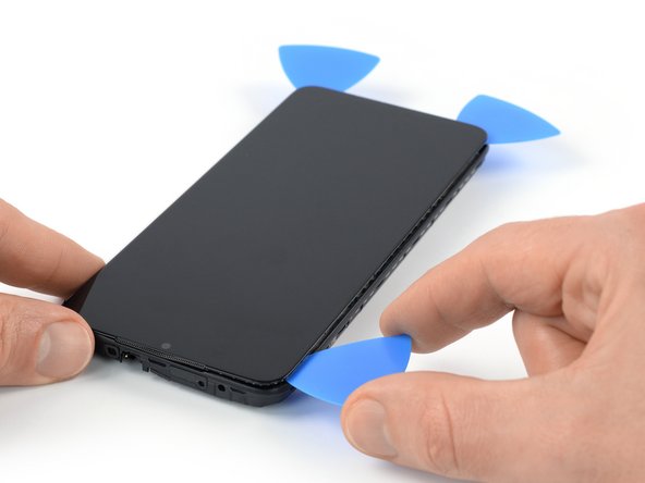 Xiaomi Redmi Note 9T Screen Replacement, Slice the left edge adhesive: crwdns2935265:032crwdnd2935265:03crwdnd2935265:03crwdne2935265:0