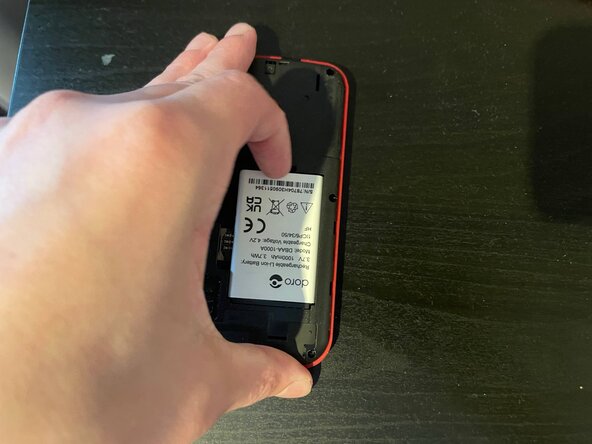 Doro 1881 Teardown, Remove the battery: crwdns2935265:02crwdnd2935265:02crwdnd2935265:03crwdne2935265:0