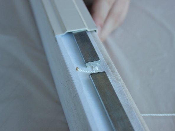 Slide the bottom rail off and set aside.