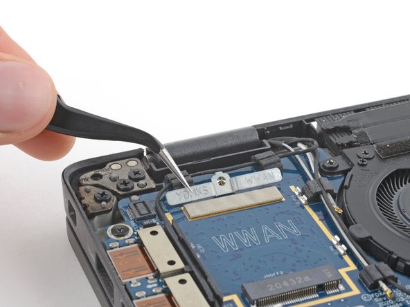 Dell Latitude 7410 I/O Board Replacement, Remove the WWAN cable bracket: crwdns2935265:011crwdnd2935265:02crwdnd2935265:03crwdne2935265:0