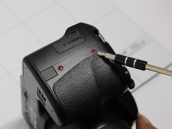 How to check Fujifilm FinePix S8200 for loose LCD connection, Rear Housing Cover: crwdns2935265:04crwdnd2935265:03crwdnd2935265:03crwdne2935265:0