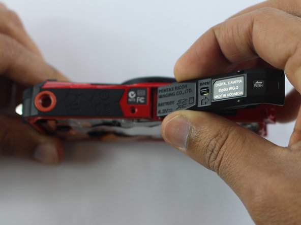 Pentax Optio WG-2 Battery Compartment Door Replacement, Battery Compartment Door: crwdns2935265:07crwdnd2935265:02crwdnd2935265:03crwdne2935265:0