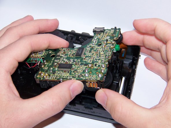 Sony Walkman WM-AF48 Headphone Jack Replacement, Remove the motherboard: crwdns2935265:03crwdnd2935265:02crwdnd2935265:02crwdne2935265:0