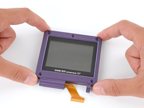 How to Reshell Your Game Boy Advance SP, Flip the shells over: crwdns2935265:039crwdnd2935265:02crwdnd2935265:02crwdne2935265:0