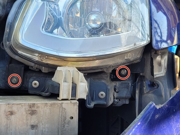 2003-2004 Infiniti G35 Front Headlight Unit Replacement: step 3, image 1 of 3