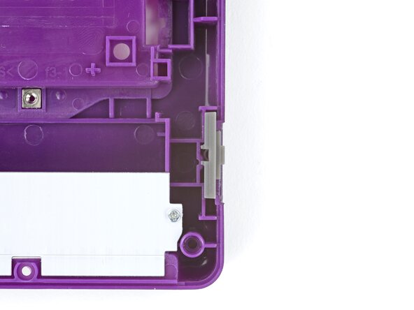 How to Reshell Your Game Boy Advance SP, Remove the power switch cover: crwdns2935265:060crwdnd2935265:02crwdnd2935265:02crwdne2935265:0